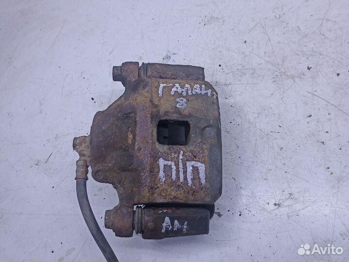 Суппорт тормозной передний п mitsubishi galant 8