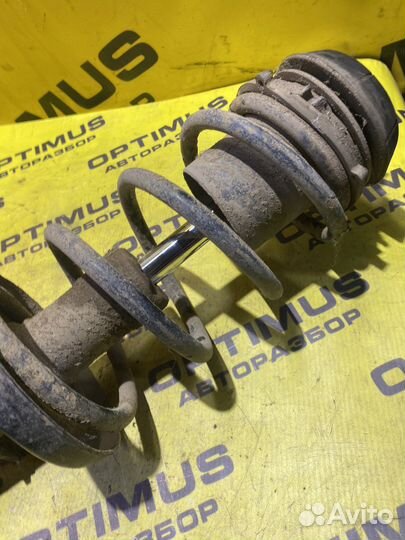 Передняя левая стойка Opel Astra G