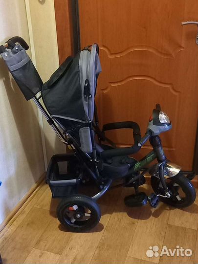 Трехколесный велосипед с ручкой