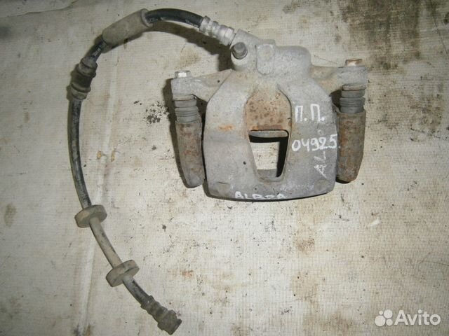 Суппорт передний правый Fiat Albea 2003) Оригиналь