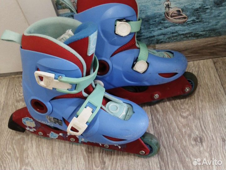 Роликовые коньки