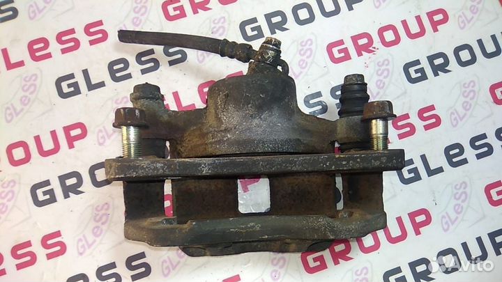 Суппорт передний GD L б/у 626 Capella