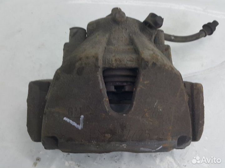 Суппорт тормозной передний левый Opel Astra