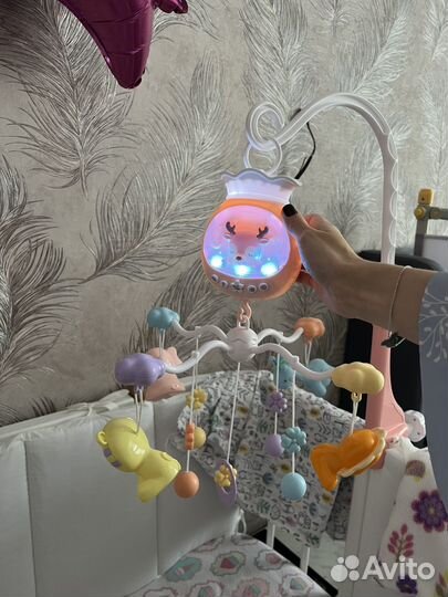 Детский мобиль в кроватку музыкальный