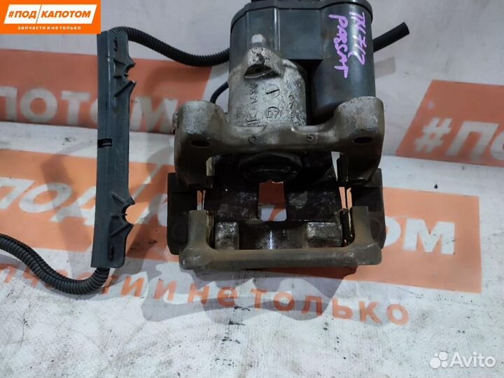 Суппорт тормозной задний правый Volkswagen Passat