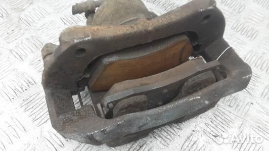 Суппорт тормозной передний левый opel astra J (PUK