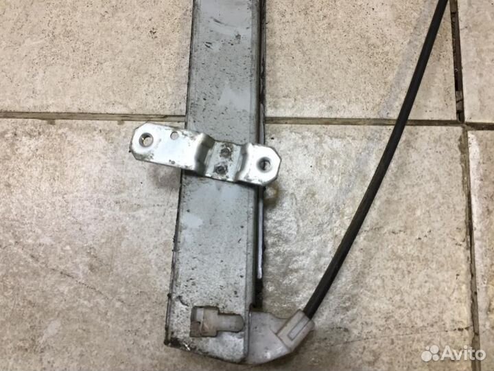 Стеклоподъемник электр. задний левый Mitsubishi La