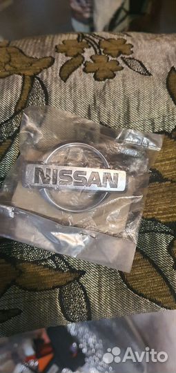 Эмблема nissan