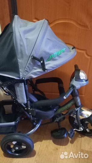 Трехколесный велосипед с ручкой