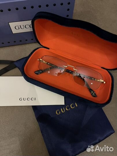 Солнцезащитные очки Gucci