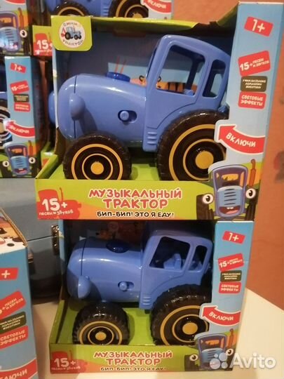 Игрушка синий трактор