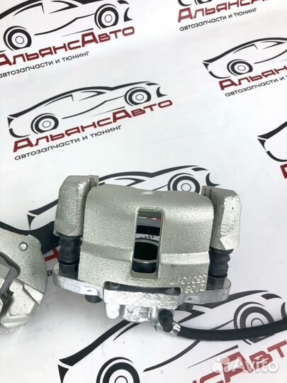 Суппорта ваз на ниву комплект - в сборе