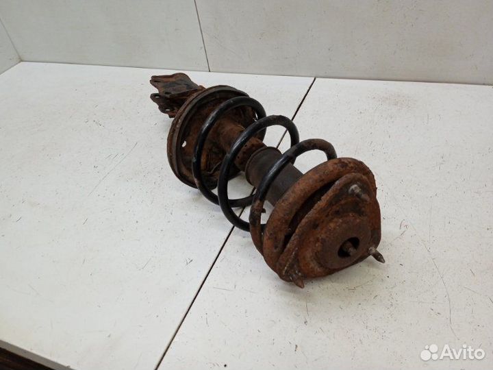 Амортизатор передний Mitsubishi Lancer 9 CS 1.6