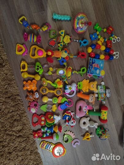 Игрушки развивашки погремушка