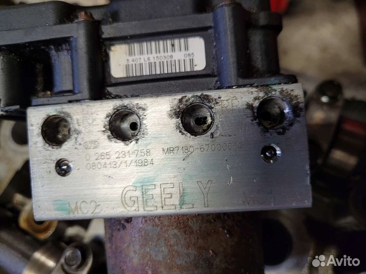 Блок ABS (насос) Geely Vision