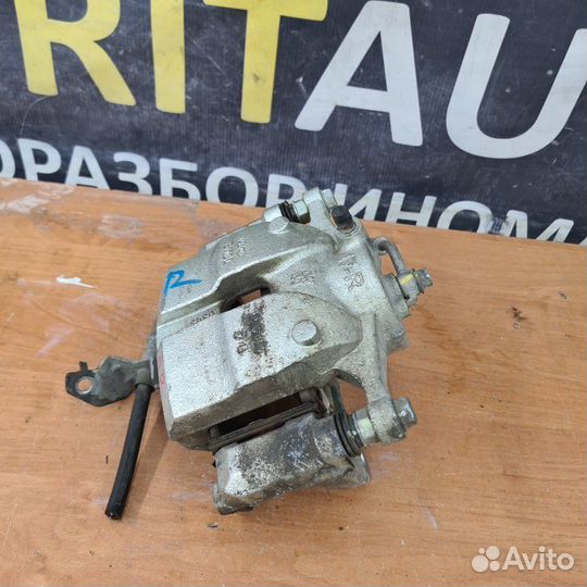 Суппорт тормозной передний правый Kia Sportage 5