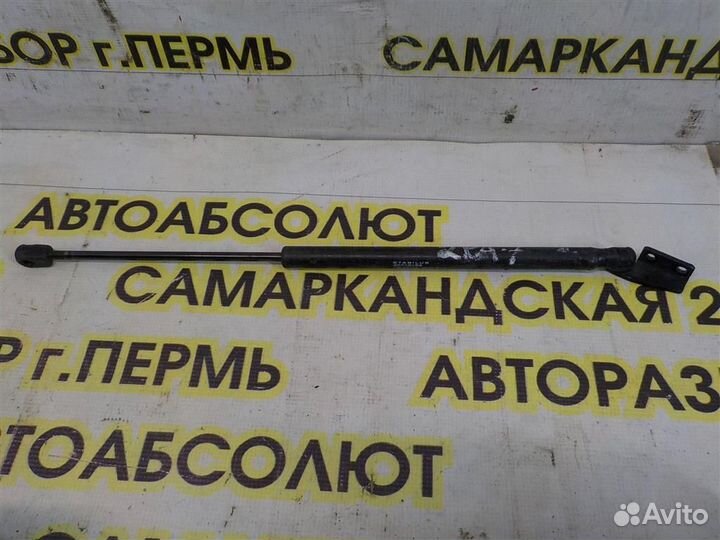 Амортизатор двери багажника Mitsubishi Outlander