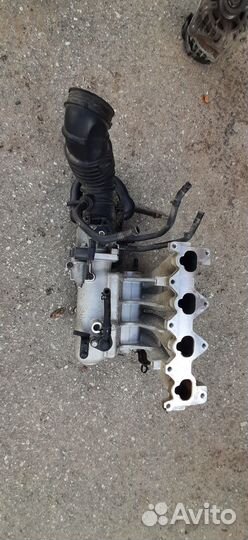 Впускной коллектор Kia Rio 2 G4EE 2010