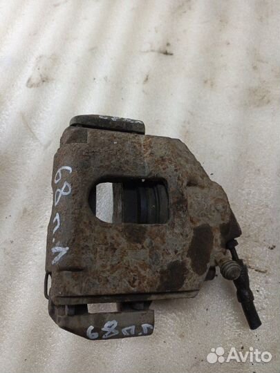 Суппорт тормозной передний левый Ford Fusion