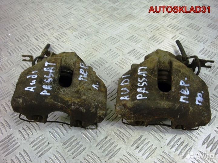 Суппорт тормозной передний VW Passat B5