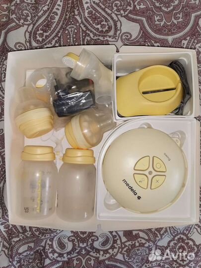 Молокоотсос электронный medela Swing