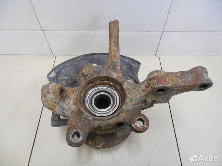 Кулак поворотный передний левый Almera Classic (B1