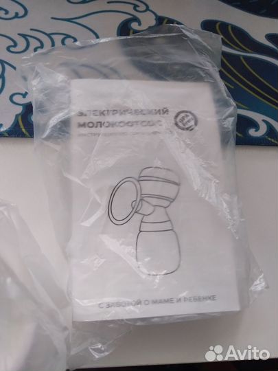 Молокоотсос электрический новый