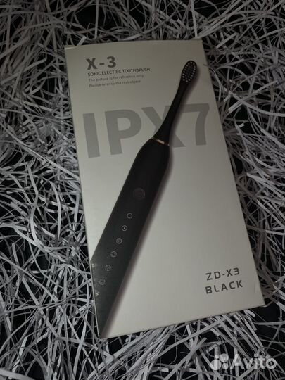 Электрическая зубная щетка