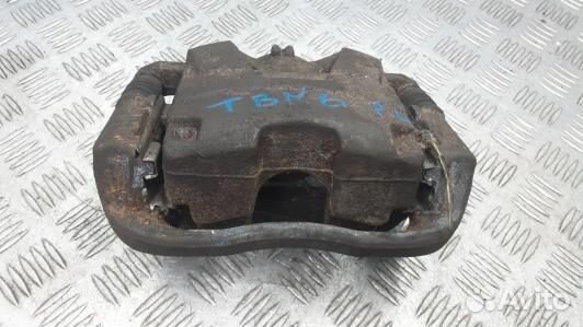 Суппорт тормозной передний левый opel astra J (TBN