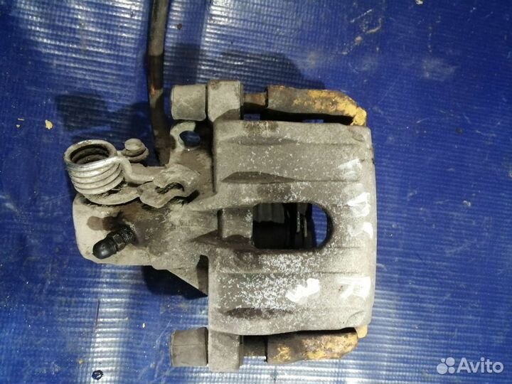 Суппорт задний правый Ford Focus 3