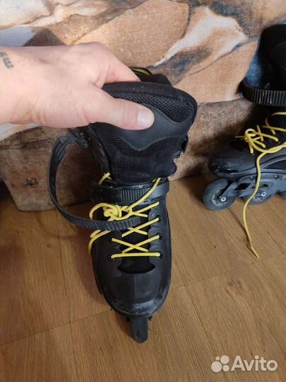 Роликовые коньки