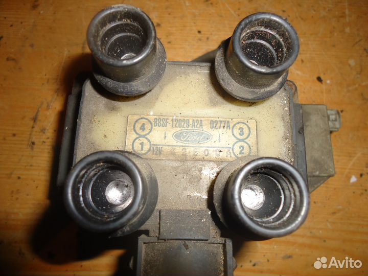 Катушка зажигания Форд Эскорт 1,6i