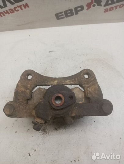 Суппорт тормозной задний левый Chevrolet Lacetti