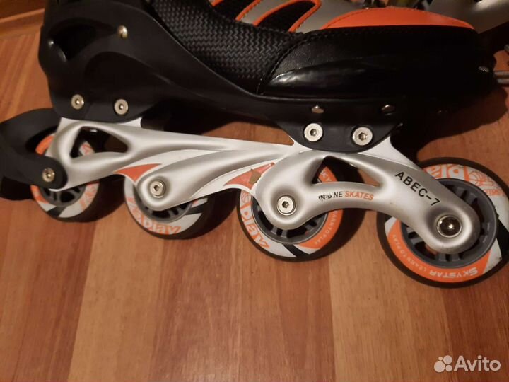 Роликовые коньки