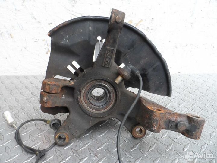 Кулак поворотный левый Mazda CX-7 ER