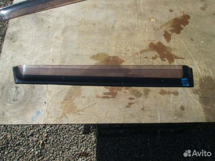 Ветровик задний левый Toyota Corolla Fielder