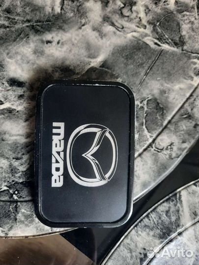 Бляха на ремень мазда