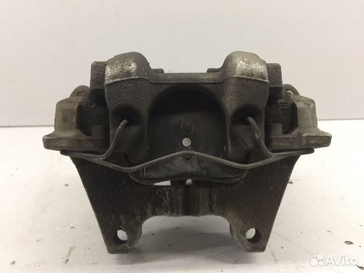 Суппорт задний левый (Volkswagen Passat)