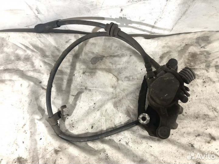 Суппорт тормозной задний правый Mazda 3 BL До