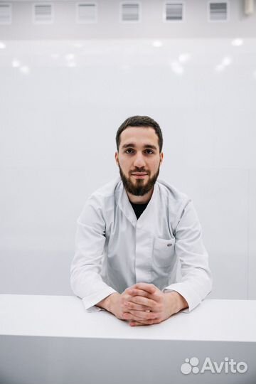 Врач стоматолог хирург