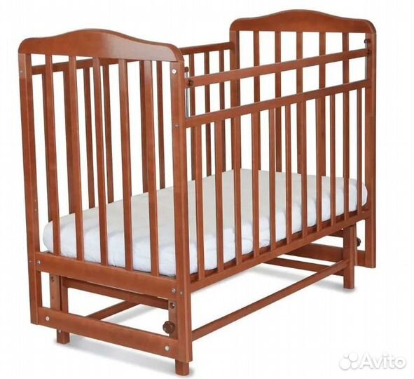 Детская кроватка с маятником