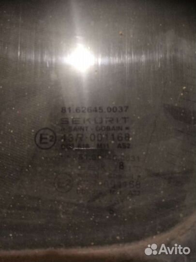 Стекло боковое, левое ман