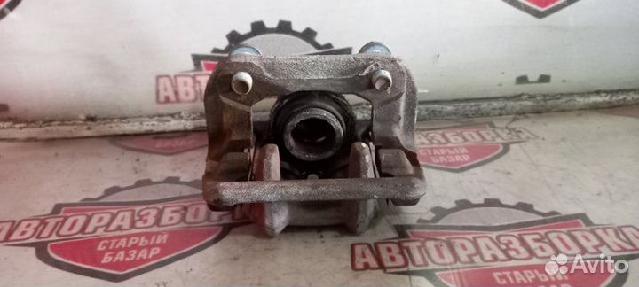 Суппорт тормозной задний левый Honda Cr-V RM4 K24A