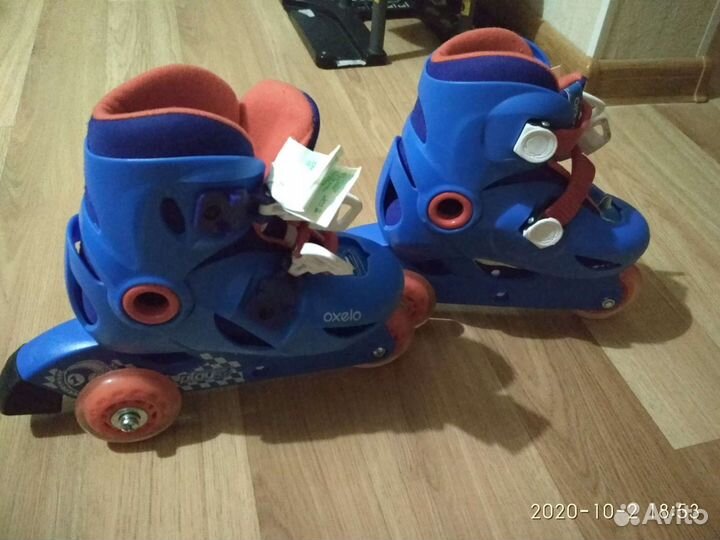 Коньки роликовые