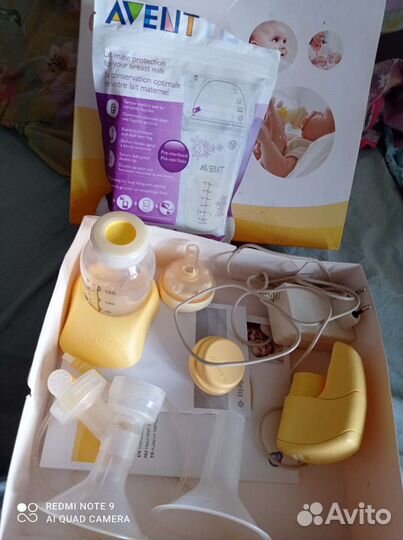 Молокоотсос medela электрический