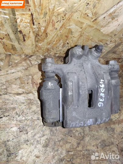 Суппорт тормозной задний правый Mazda CX-7 ER