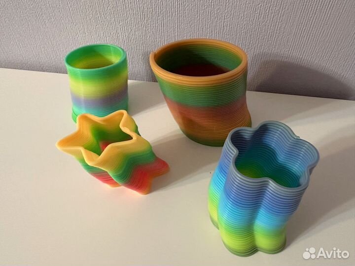Радужные игрушки пружинки 4 шт