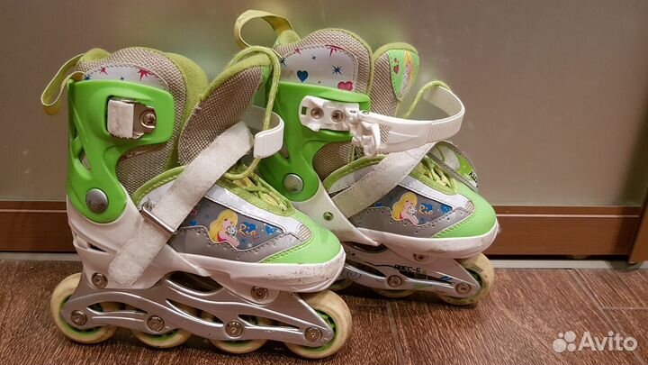 Роликовые коньки