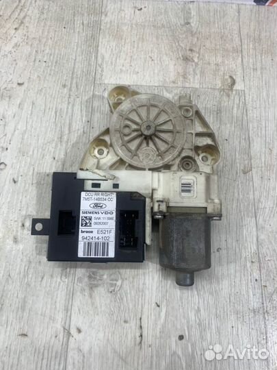 Моторчик стеклоподъемника задний правый Ford Focus