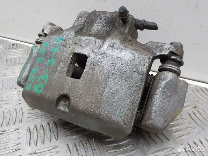 Суппорт тормозной передний левый на Mitsubishi Lan